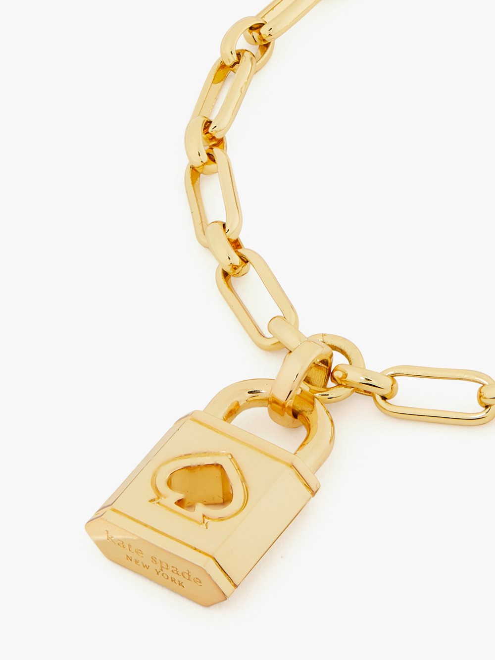 Women's gold. lock and spade charm bracelet | Kate Spade