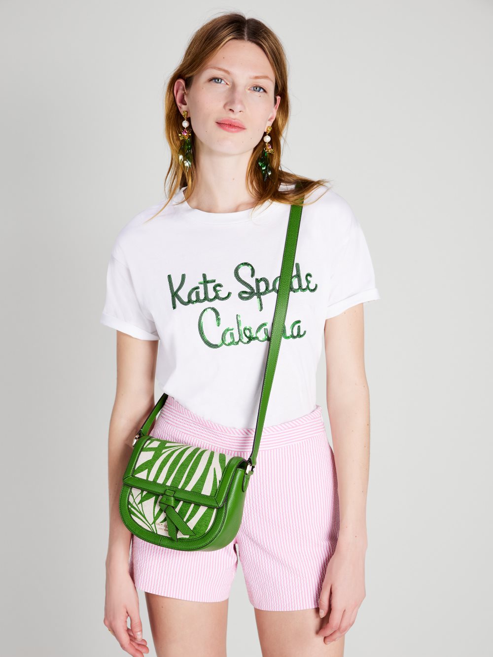 Women's bitter greens multi knott palm canvas medium saddle bag | Kate Spade