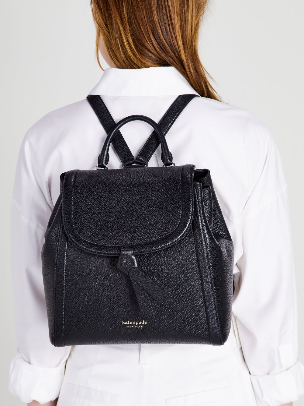 Women's black knott medium flap backpack | Kate Spade