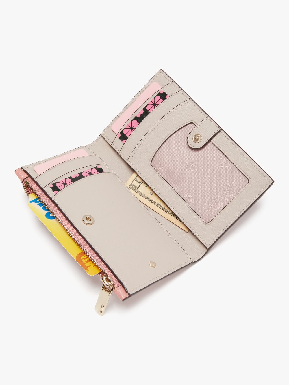 Women's serene pink spencer small slim bifold wallet | Kate Spade
