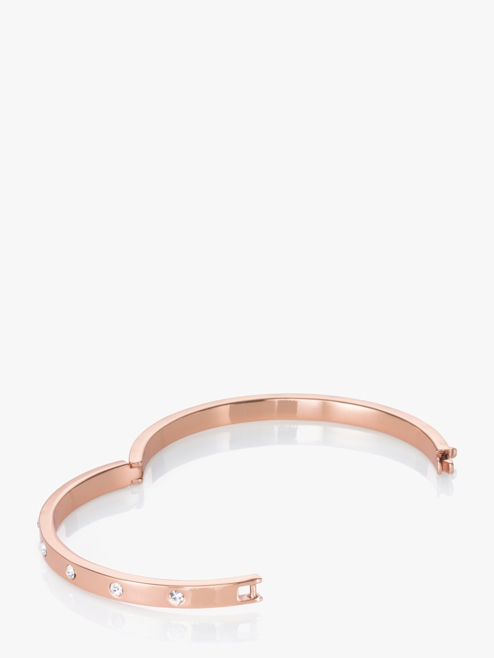 Women's clear/rose gold set in stone enamel stone hinged bangle | Kate Spade